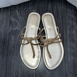 Women’s sandals. Size 9. Brand Unisa. Color gold.